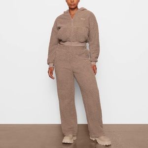 SKIMS Cozy Fleece Track Pants in desert